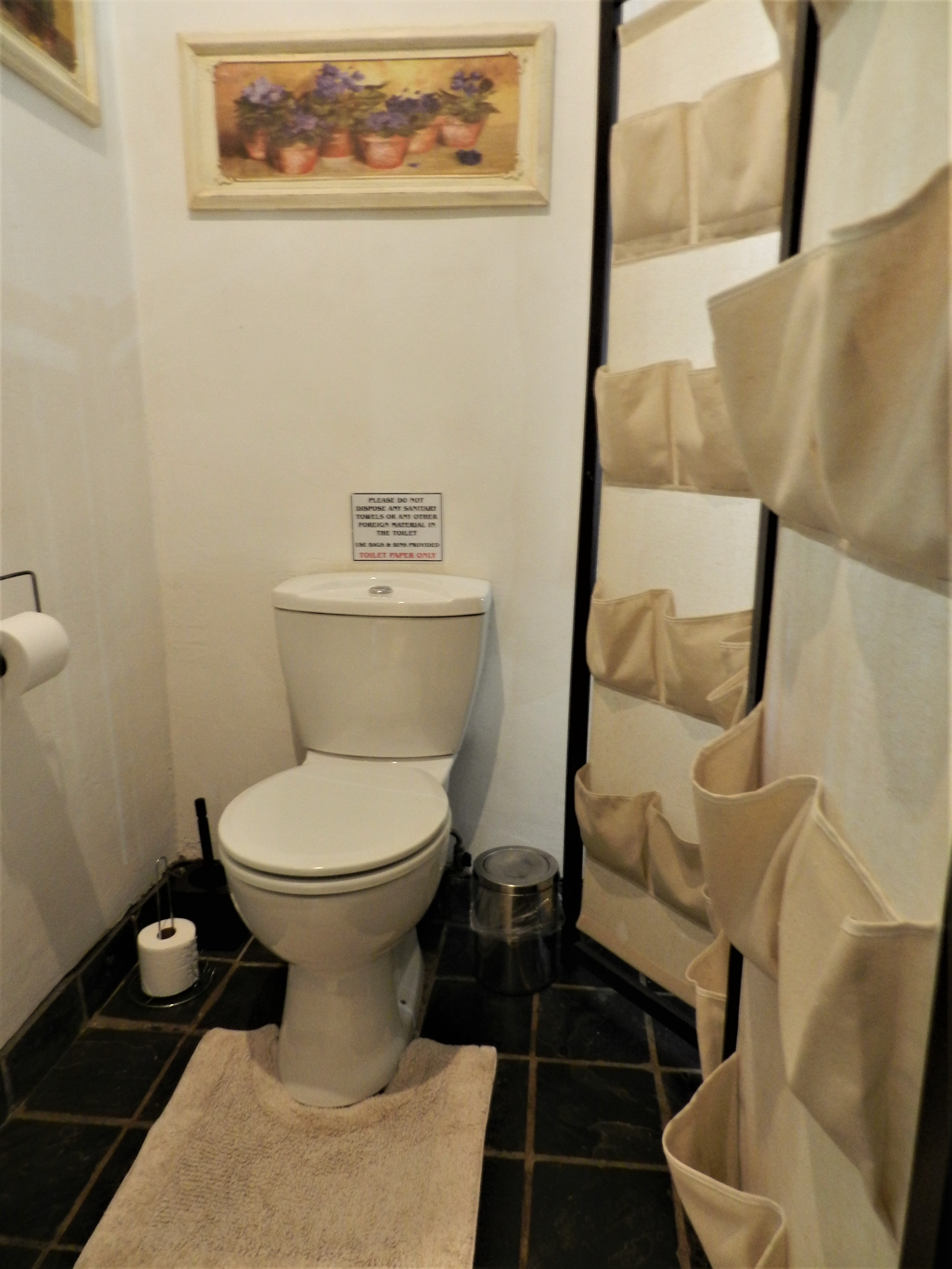 Bridal suite en-suite toilet behind screen at the President Paul Kruger Guest Lodge